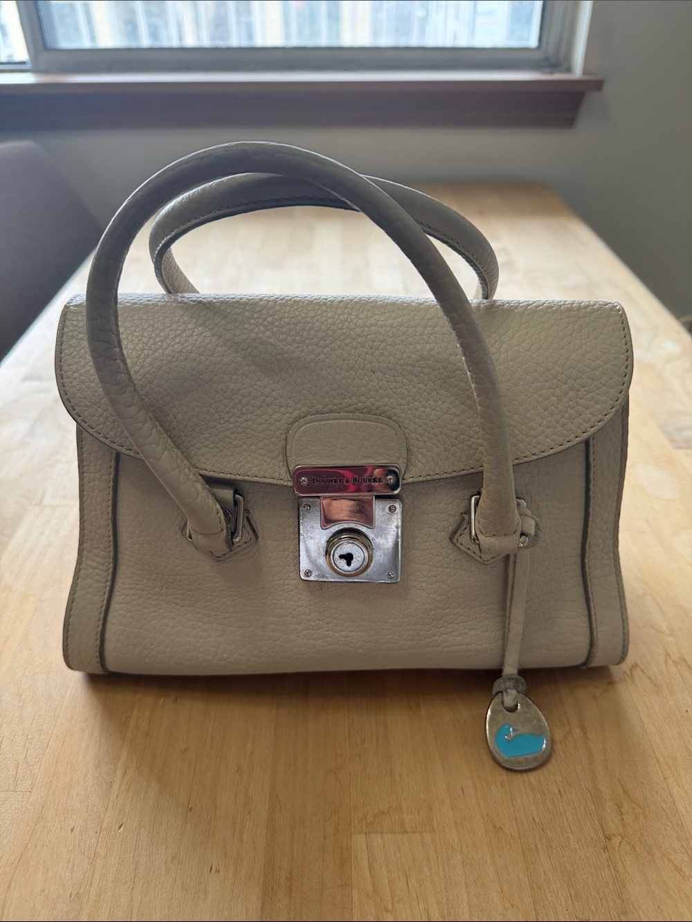 Dooney & Bourke Cream Pebbled Leather Satchel with Lock